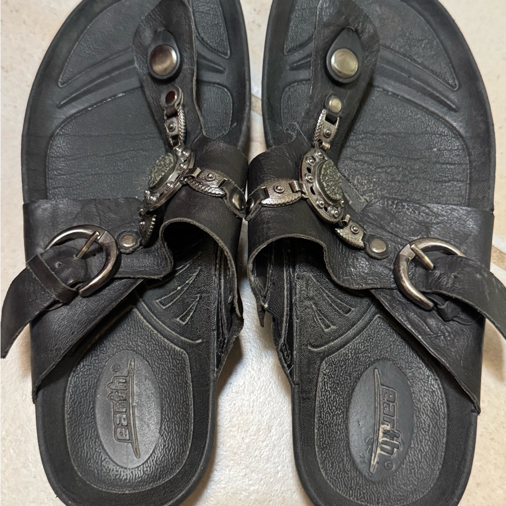 Earth Black Leather Sandals with Metal Accents
